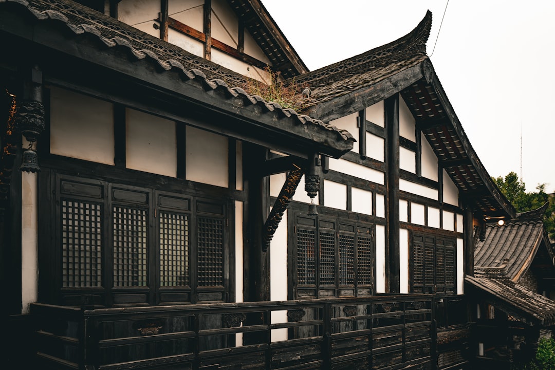 Traditional japanese building with dark wood and white walls